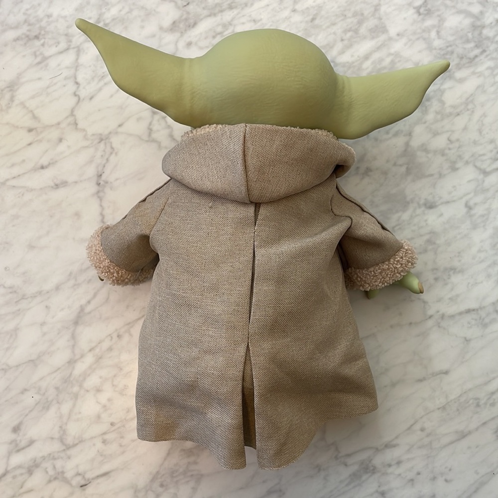 Baby Grogu, sits about 12”. He has a bean bag base to prop him up on his own. - Picture 3 of 4